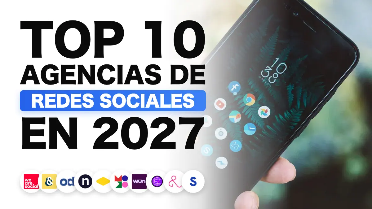 Mano sosteniendo un móvil con aplicaciones de redes sociales, que ilustra la clasificación de las mejores agencias de redes sociales de Francia