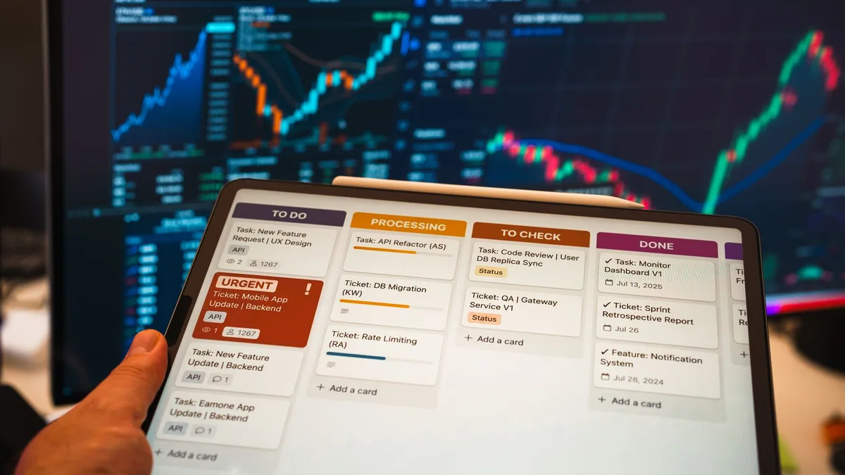 Tablet showing a task management workflow on a desk, illustrating the ranking of the best marketing automation agencies in France