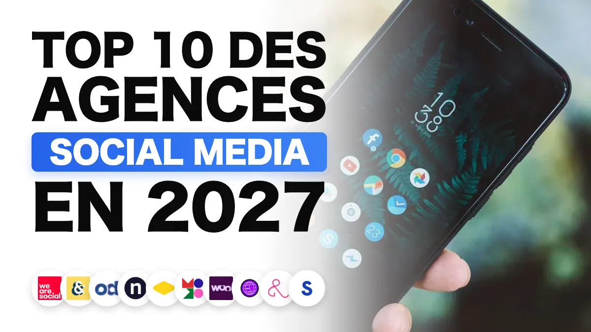 Main tenant un smartphone affichant des applications de réseaux sociaux, illustrant le classement des meilleures agences social media en France