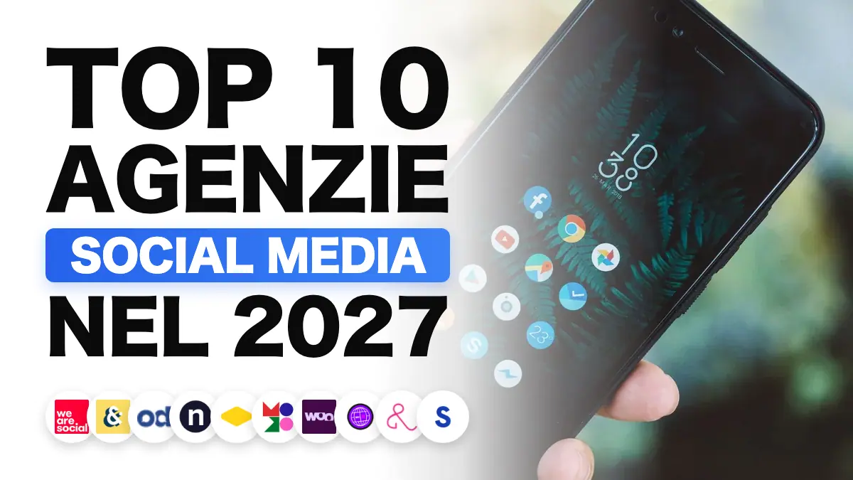 Mano che regge uno smartphone con le app dei social network, che illustra la classifica delle migliori agenzie social media in Francia