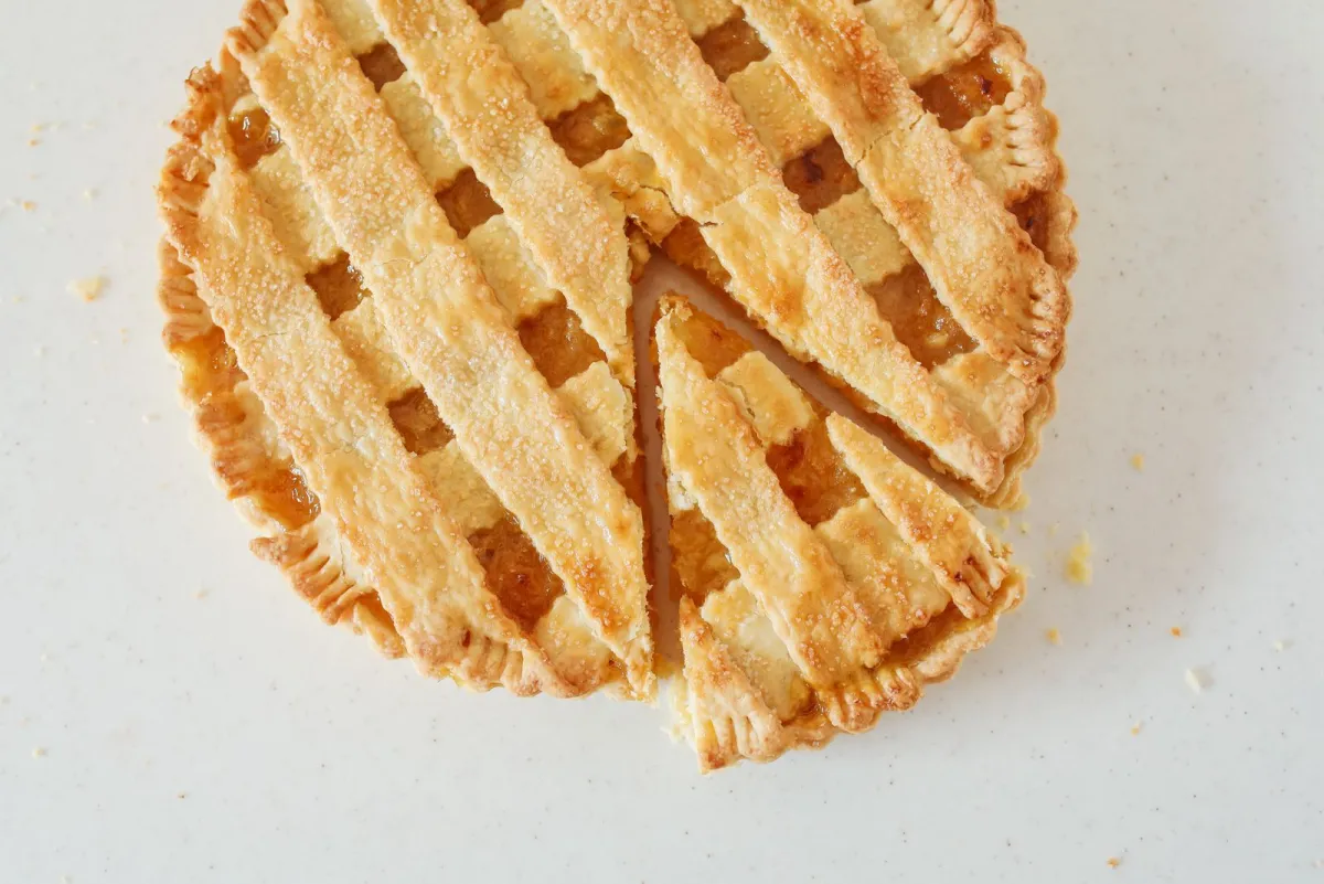 Lattice pie with one slice cut, seen from above